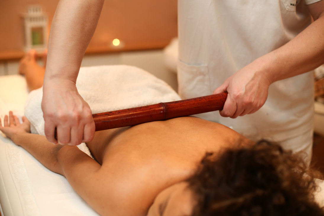 Massage with a bamboo stick